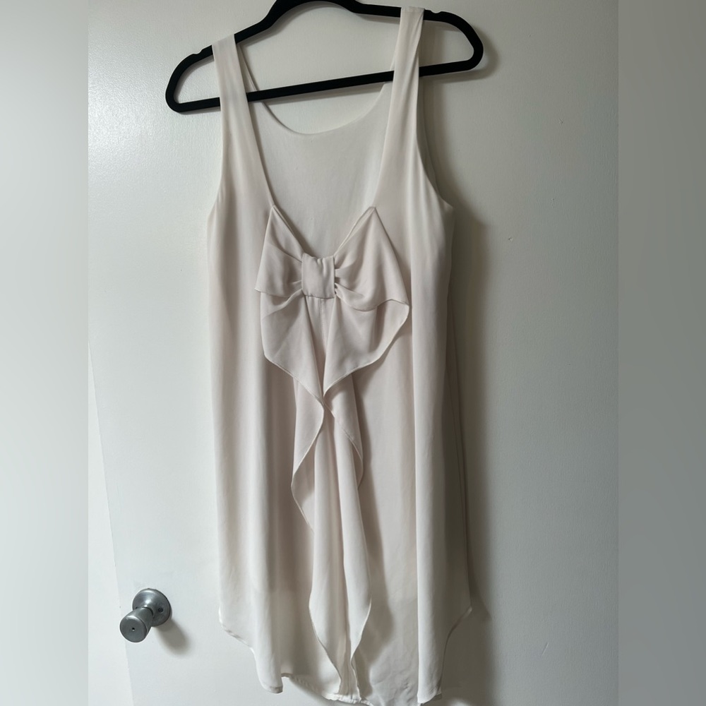GUC Cream Sleeveless long top with now detail on back